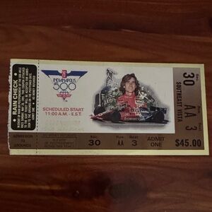 Indy 500 Racing Collectible Ticket with Red and Black Design